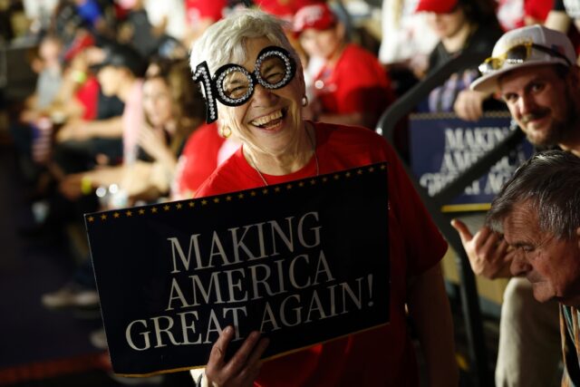 Fans gather to celebrate US President Donald Trump's 100th Day in office in Warren, Michig