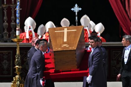 After the funeral, the Argentine pontiff's plain wooden coffin was driven slowly to Rome's