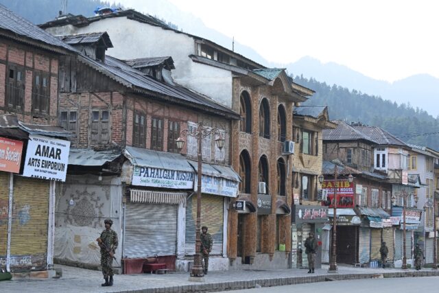 Indian paramilitary personnel patrol Pahalgam after gunmen killed 26 people visiting the p