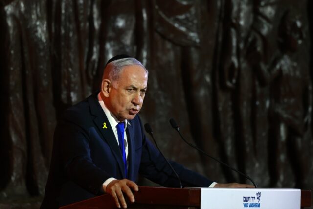 Israeli Prime Minister Benjamin Netanyahu speaks during a ceremony marking Holocaust Remem