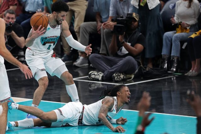 Ja Morant of the Memphis Grizzlies reacts after a hard fall during game three of the Grizz