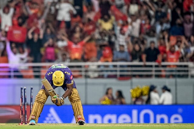Kolkata Knight Riders' Andre Russell reacts after getting clean bowled to end his side's f