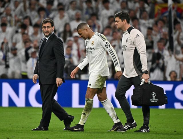 Kylian Mbappe hobbles of the pitch during REal Madrid's Champions League quarter final tie