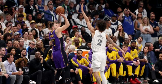 Tearful Doncic scores 45 on return to Dallas as Lakers clinch playoff ...