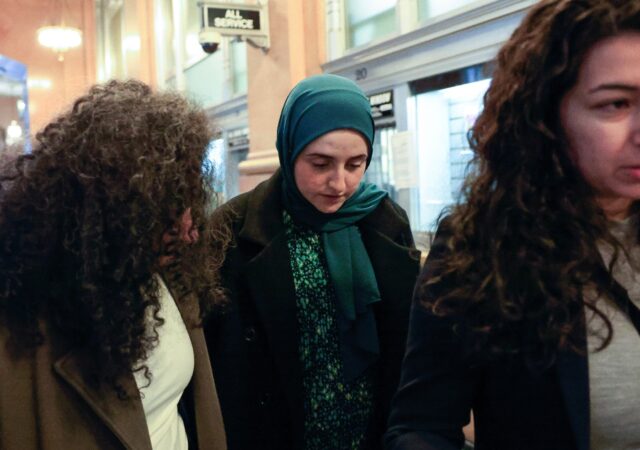 Mahmoud Khalil's wife Noor Abdalla (center) leaves after a hearing in court in Newark, New