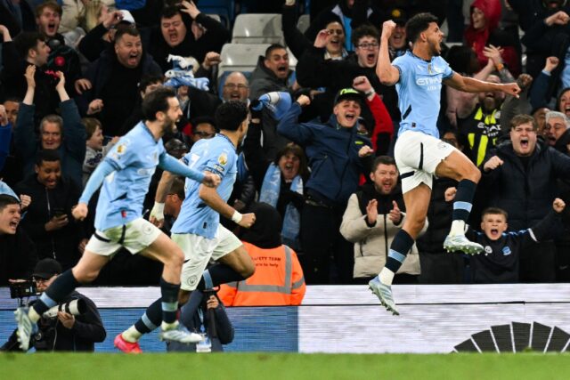 Manchester City's Matheus Nunes (R) celebrates after scoring against Aston Villa