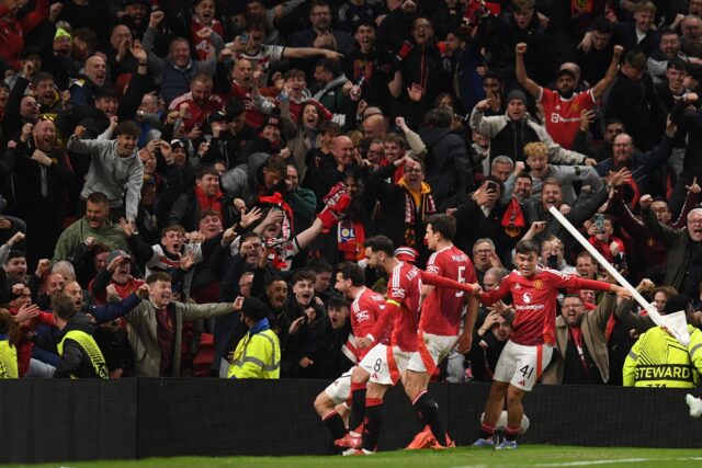 Manchester United celebrate after completing their comeback against Lyon in the Europa Lea
