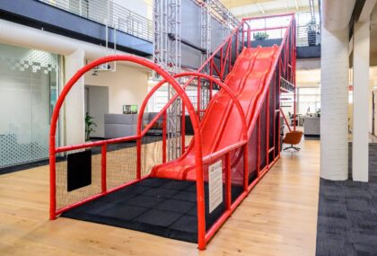 A slide that employees use to zip down to the first a floor inside YouTube's headquarters