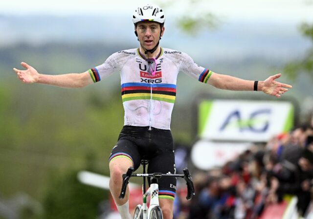 Tadej Pogacar celebrates his victory in the Fleche Wallonne