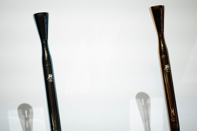 The torches for the Milano Cortina 2026 Winter Olympics (L) and Paralympics (R) have been