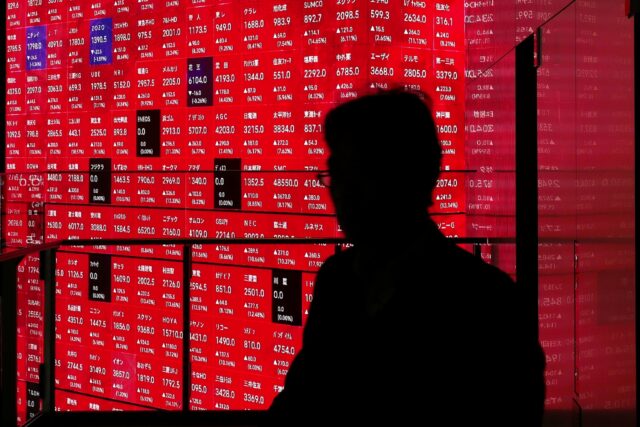 In early trade in Asia Friday, Japan's Nikkei tumbled over five percent, handing back some