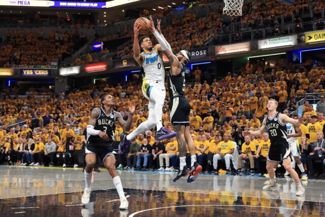 Tyrese Haliburton drives to the basket in Indiana's overtime victory over Milwaukee