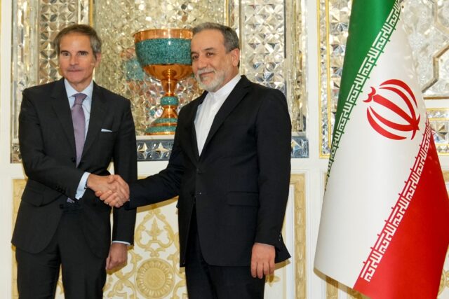 UN nuclear watchdog chief Rafael Grossi (L) meets Iranian Foreign Minister Abbas Araghchi
