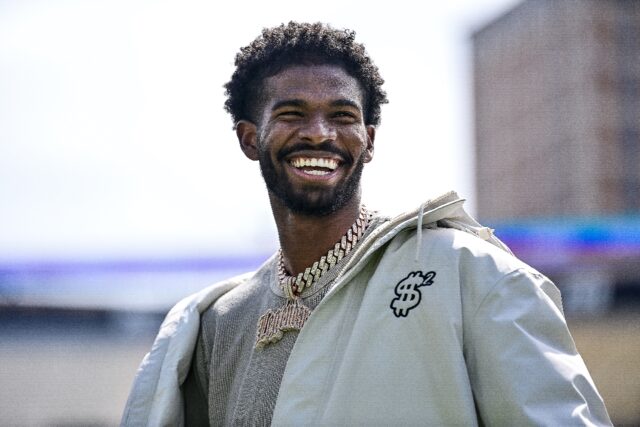 Former University of Colorado Buffaloes quarterback Shedeur Sanders looks on during a cere