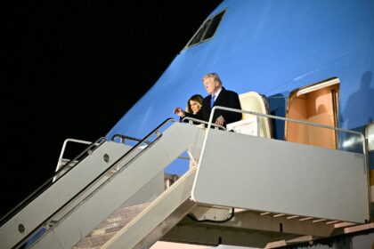 US President Donald Trump and First Lady Melania Trump step off Air Force One in Rome afte