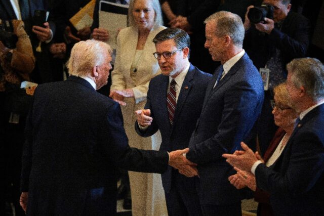 US President Donald Trump (left) is relying on the negotiation skills of House Speaker Mik