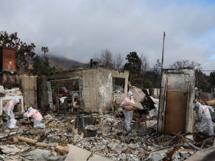 ALTADENA, CALIFORNIA - FEBRUARY 05: Volunteers with Samaritan's Purse search for meaningfu