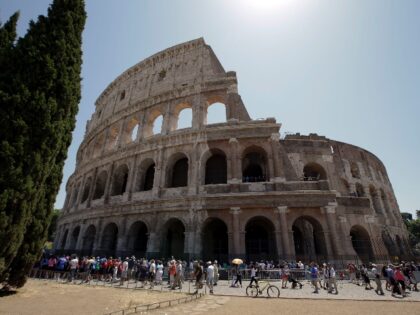 FILE -- In this July 1, 2016 file photo tourists visit the ancient Roman Colosseum, in Rom
