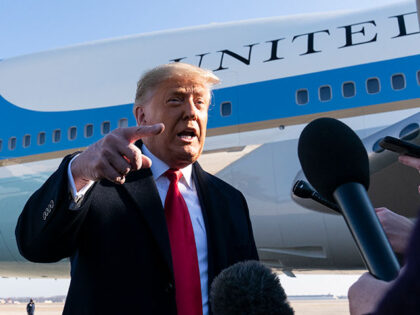 President Donald Trump speaks with reporters before boarding Air Force One upon departure,