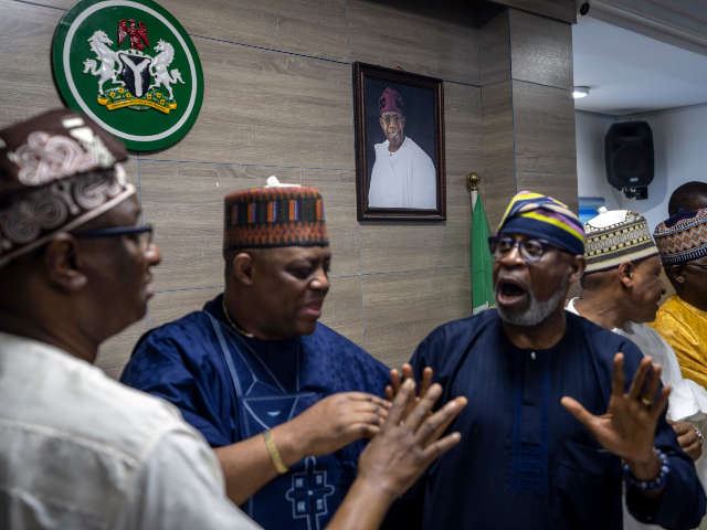 All Progressives Congress (APC) party officials Festus Keyamo, left, Femi Fani-Kayode, cen