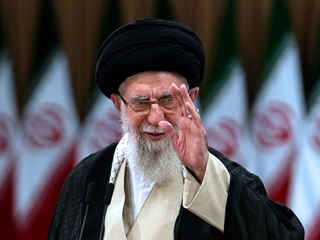 Iranian Supreme Leader Ayatollah Ali Khamenei waves after casting his vote for the presidential runoff election in Tehran, Iran, Friday, July 5, 2024. Iranians began voting Friday in a runoff election to replace the late President Ebrahim Raisi, killed in a helicopter crash last month, as public apathy has become pervasive in the Islamic Republic after years of economic woes, mass protests and tensions in the Middle East. (AP Photo/Vahid Salemi)