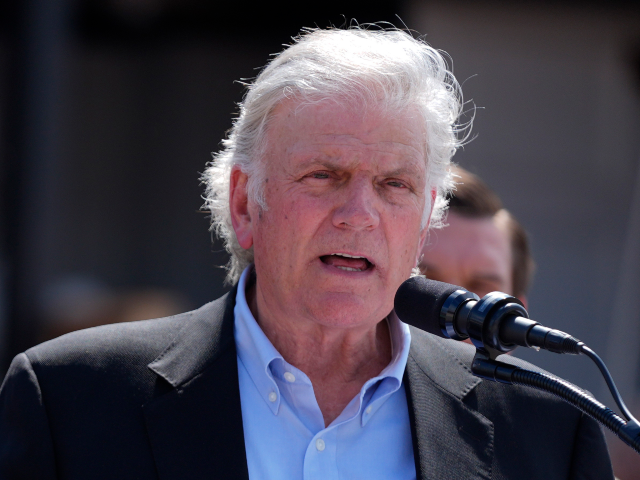 AP24274663623577 Republican presidential nominee former President Donald Trump listens as Rev. Franklin Gra