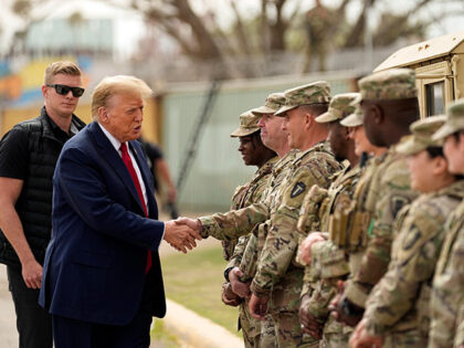 Republican presidential candidate former President Donald Trump greets members of the Nati