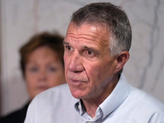 AP24297639174179 FILE — Gov. Phil Scott updates reporters after remnants of Hurricane Beryl caused floodi