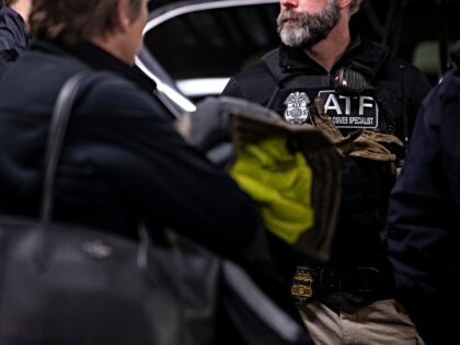 Bureau of Alcohol, Tobacco, Firearms and Explosives (ATF) agents, along with other federal