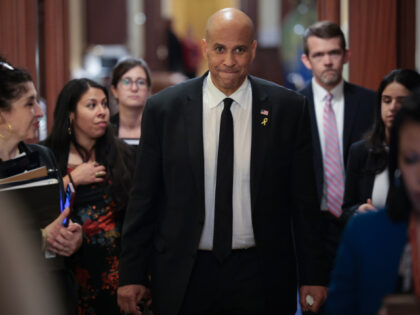 U.S. Sen. Cory Booker (D-NJ) walks toward reporters after delivering a record setting floo