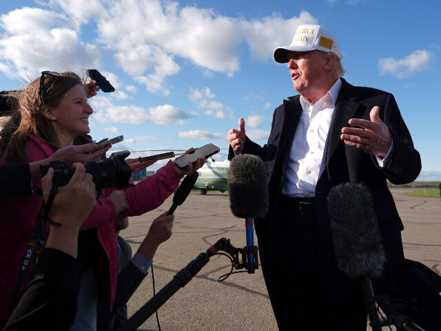 Donald Trump President Donald Trump speaks with reporters before boarding Air Force One at Morristown M