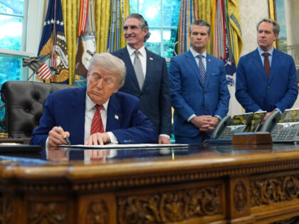 President Donald Trump signs an executive order regarding reinvigorating the nuclear indus