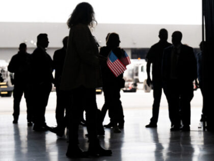 The first group of Afrikaners from South Africa to arrive for resettlement listen to remar