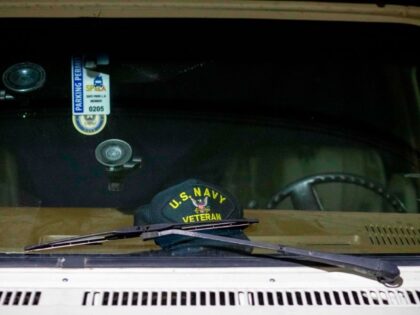 Items are viewed in the windshield of a camper in the Safe Park LA parking lot near the Ve