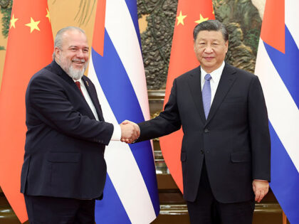 Chinese President Xi Jinping meets with Cuban Prime Minister Manuel Marrero Cruz at the Gr