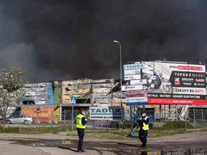 WARSAW, MASOVIAN VOIVODESHIP, POLAND - 2024/05/12: Black smoke seen in the sky above the b