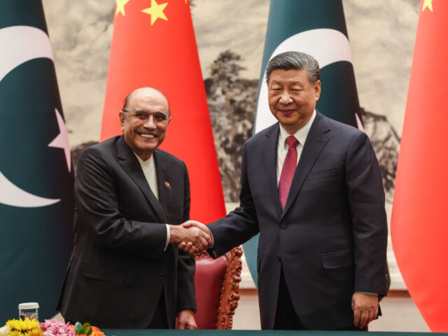 GettyImages-2197197572 BEIJING, CHINA - FEBRUARY 5: Chinese President Xi Jinping (R) and Pakistani President Asif