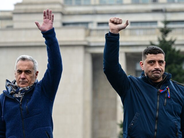 Far-right presidential candidate Calin Georgescu (L) and George Simion (R), leader of the