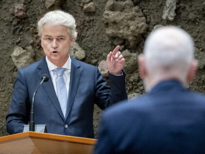 The Netherlands' far right PVV party leader Geert Wilders (L) addresses a speech next to l