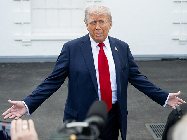US President Donald Trump speaks with reporters outside the White House in Washington, DC,