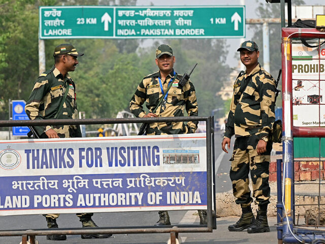 GettyImages-2212226005 Indian Border Security Force (BSF) soldiers stand guard near the India-Pakistan Wagah bord