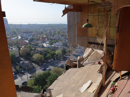 This photograph taken on May 1, 2025 shows a destoyed apartment in a residential building