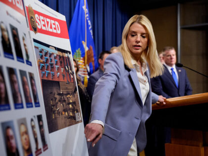 WASHINGTON, DC - MAY 6: U.S. Attorney General Pam Bondi points to a photograph of Heribert
