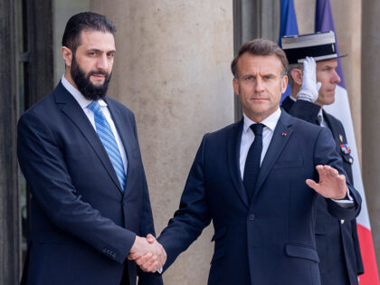 ‘Handshake of Shame’: Macron Welcomes Islamist Al-Qaeda-Linked President of Syria to Pa