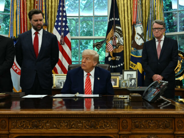 US-POLITICS-TRADE-TRUMP US President Donald Trump makes a trade announcement as US Secretary of Commerce Howard Lu