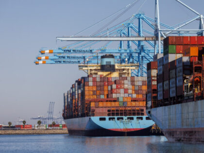 LOS ANGELES, CA - MAY 9, 202: Container ships are among the few unloaded and loaded at th