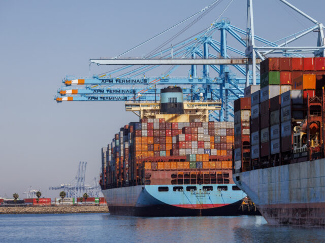 LOS ANGELES, CA - MAY 9, 202: Container ships are among the few unloaded and loaded at th