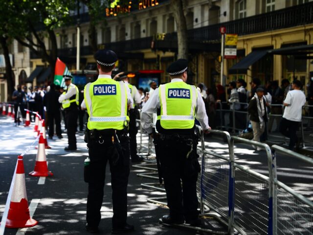 LONDON, ENGLAND - MAY 11: Police officers are pictured as people take part in a protest ou
