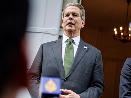US Treasury Secretary Scott Bessent (L) and US Trade Representative Jamieson Greer speak t