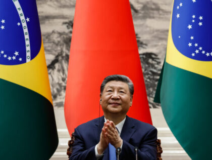 BEIJING, CHINA - MAY 13: Chinese President Xi Jinping applauds after a a joint press confe